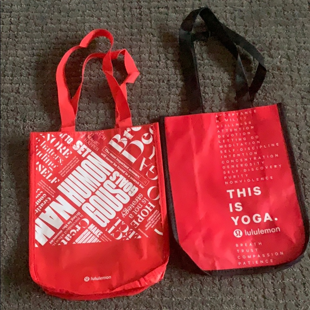 Two Lululemon shopping bags
